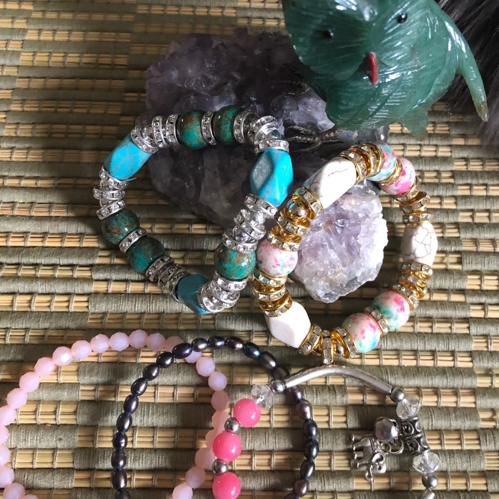 five beaded bracelets